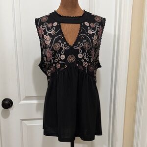 Tempted Black Sleeveless Blouse with Floral Designs